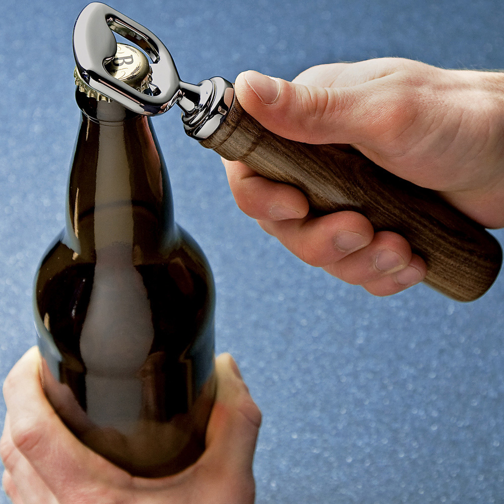 A completed Rockler Pewter Bottle Opener being used to open a bottle - main pic