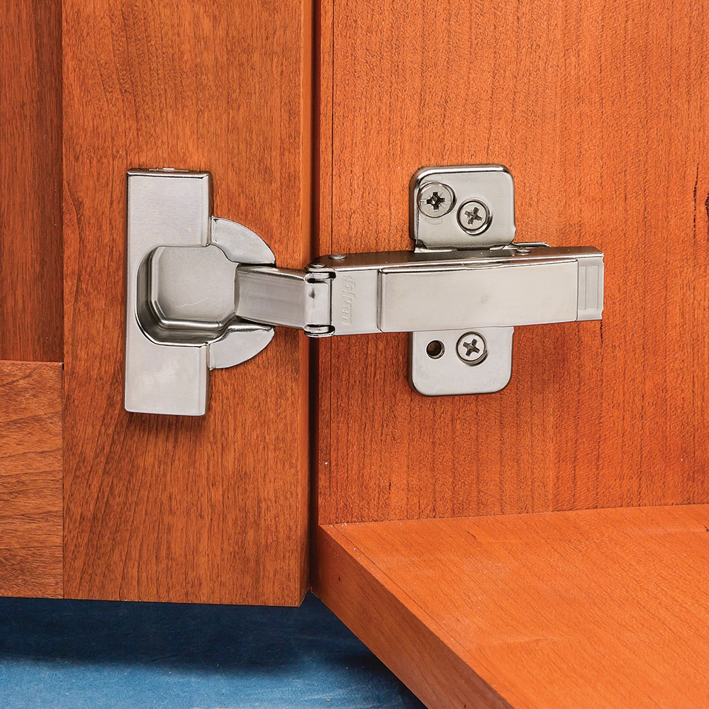 Blum&reg; 120&deg; Clip Top Frameless Overlay Snap Close Hinges - Snap Closing Hinge installed on a cabinet - main pic