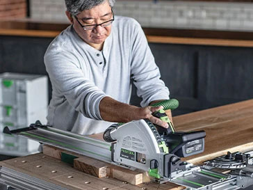 Cutting lumber with a track saw