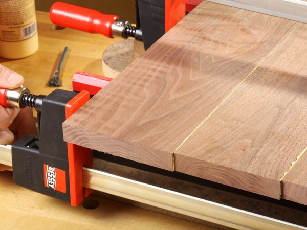 Clamping a wood panel during glue-up