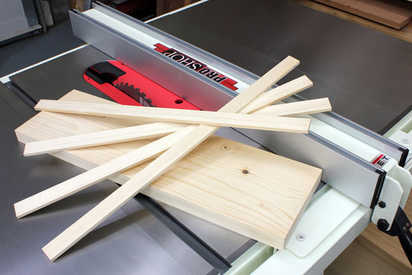 Thin cut wood strips on a table saw