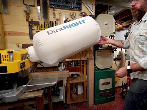 Attaching dust collection bag to planer dust port