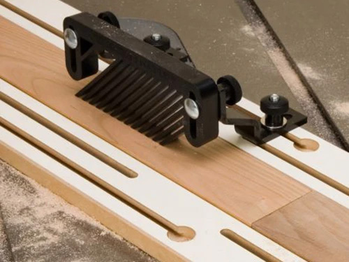 Cutting cove in board using a featherboard and jig