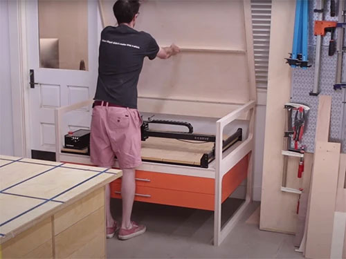 CNC worktable with lifting tabletop and drawers