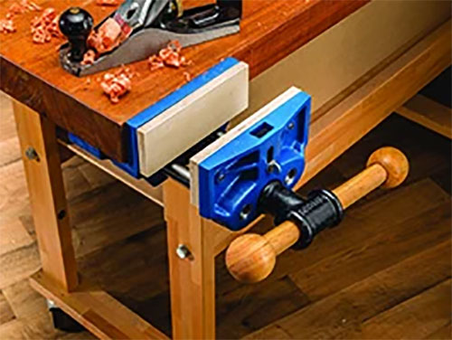 Adjusting vise attached to workbench