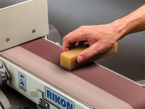 Rockler abrasive stick cleaning a belt sander
