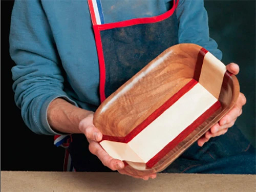 Layered rectangular bowl created with a scroll saw