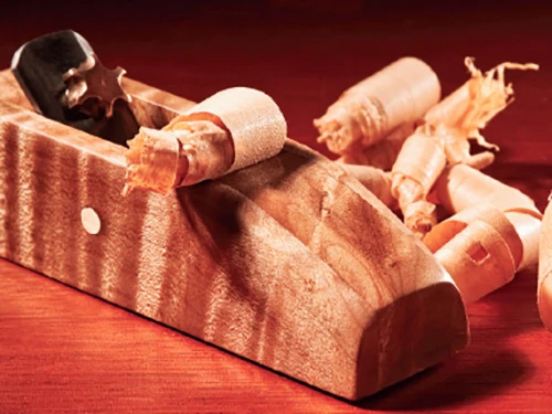 Finger plane made from scrap wood and a recycled chisel blade