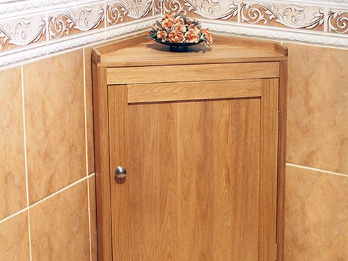 Small cabinet that fits in a room corner
