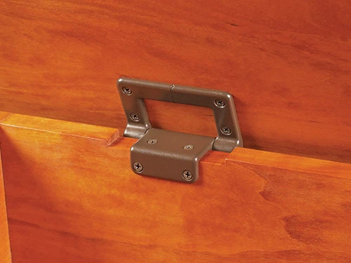 Using a lid stay torsion hinge to support a chest lid