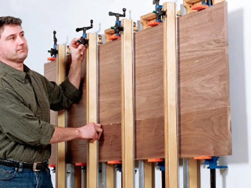 Workshop panel press made with pipe clamps