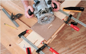Milling fence slots with a slot cutting jig