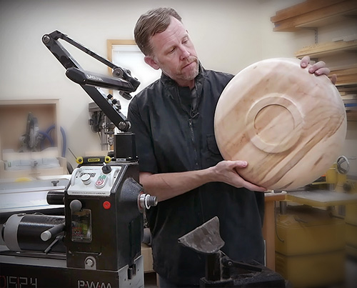 woodworking showing the bottom of a wood turned platter