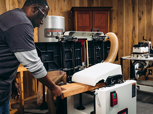 Lifting jointer table to access planer funtion