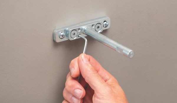 adjusting shelf supports