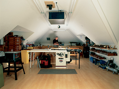 Woodworking shop in large home attic