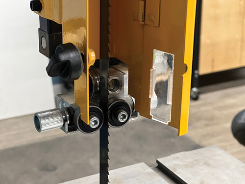 Guide bearing system for powermatic band saw