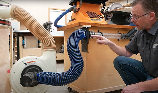 dust collector with hoses going to benchtop tools