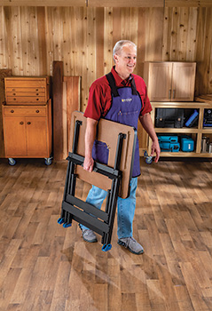 Transporting folded rock-steady stand around workshop