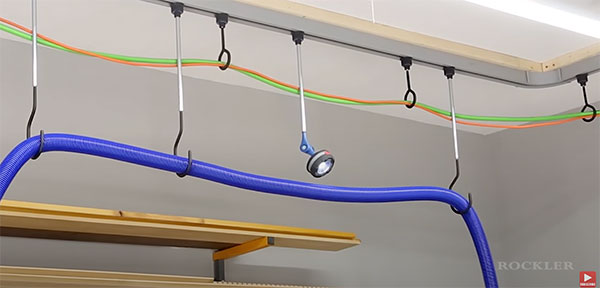 ceiling track holding wires and hoses