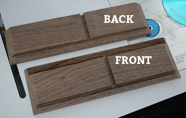showing from and back wood pieces after being routers