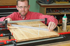 Use a metal straight edge to check the flatness of the panel
