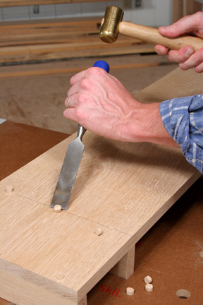 Use a sharp chisel to resize installed wood plugs