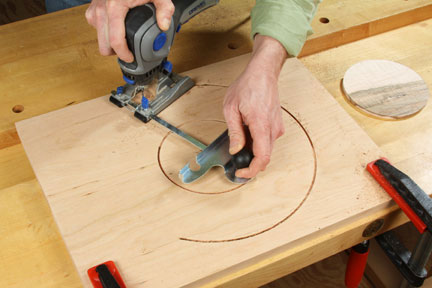 Using circle cutter to separate center inlaid portion from lazy susan tray