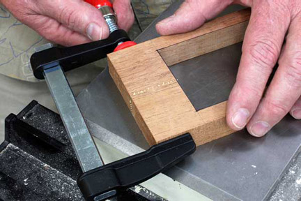 Gluing and clamping two halves of drawer box front frame