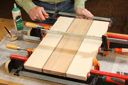 Clamping and gluing scrap pieces into cutting board shape