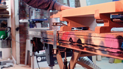 Stablizing mini workbench by clamping it to table