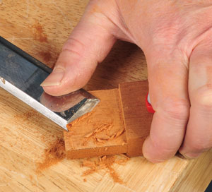 Cleaning up tenon cut with a chisel