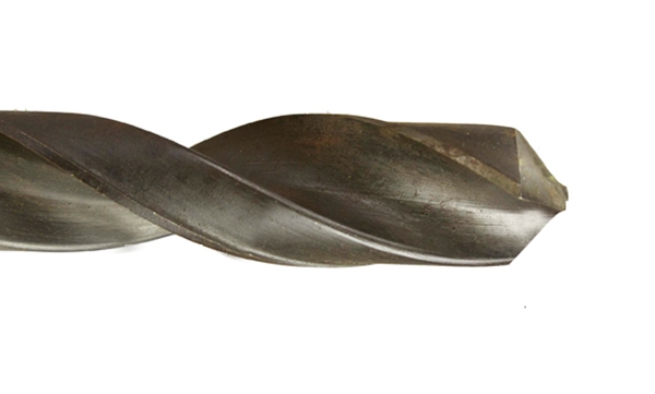Close up of the end and point of a twist drill bit
