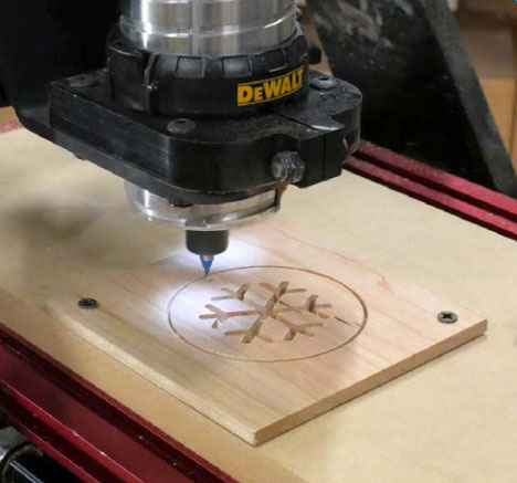 cutting out ornament with CNC router