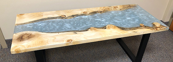 Finished and cured epoxy river table