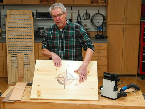 Shaper cnc router cut inlay installed in pine panel