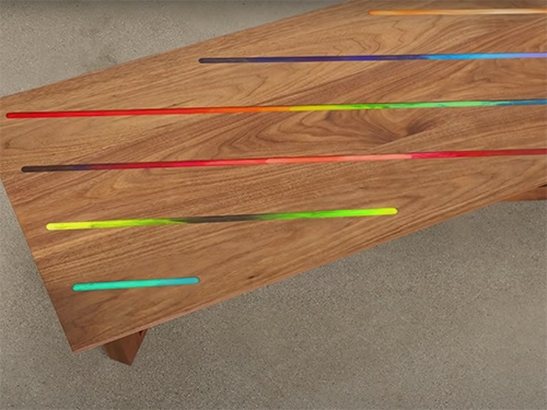 Mid-century modern coffee table with decorative crayon and epoxy design