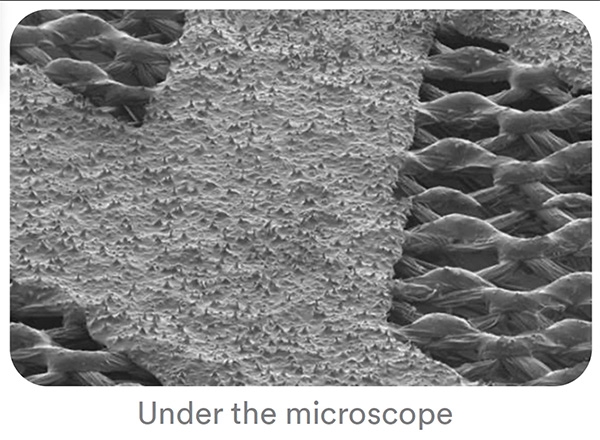 cubitron sandpaper grain magnified by a microscope