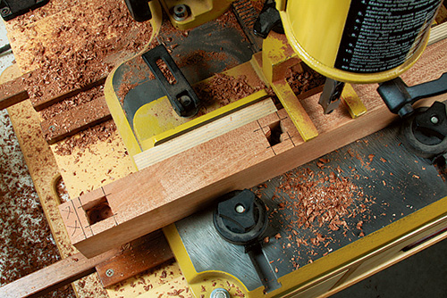 Milling mortises in storage box legs with mortising machine