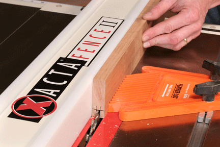 Using a featherboard to guide groove cuts
