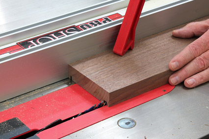 Using a table saw and dado blade to cut grooves for top and bottom of box
