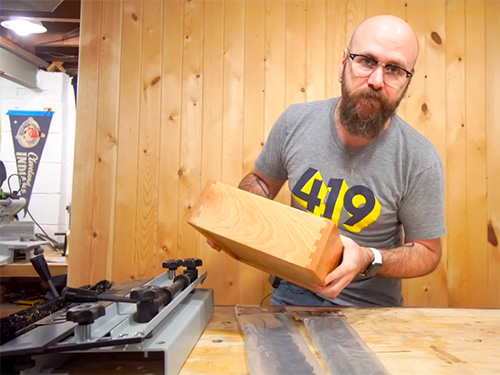 Half blind dovetail joint cut with jig and router