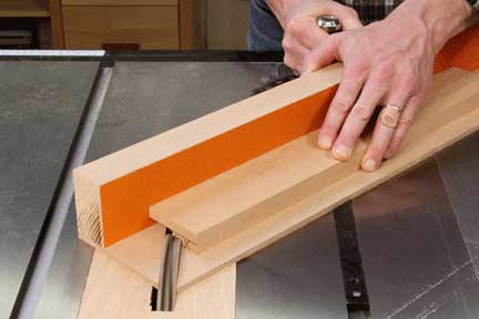 Sawing waste from miter shoulder lap