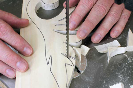 Cutting individual points of band saw leaf pattern