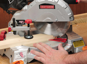 Using a compound miter saw to cut miter joints