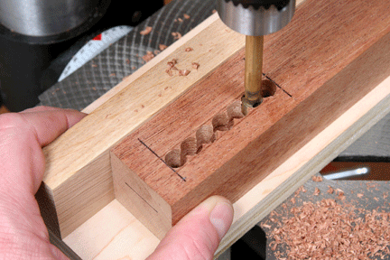 Cutting waste between spaced holes