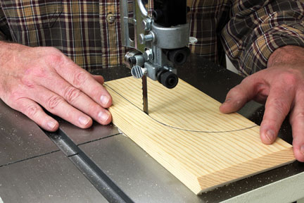 Using band saw to cut a panel guide