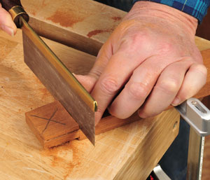 Couting the other side of the tenon with hand saw