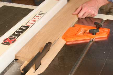 Cutting scrap strip for spline with featherboard