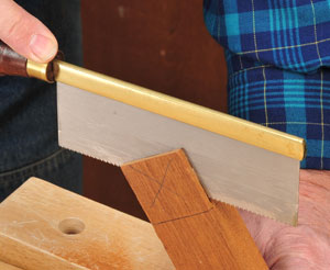 Finishing tenon cuts with a fine-toothed hand saw